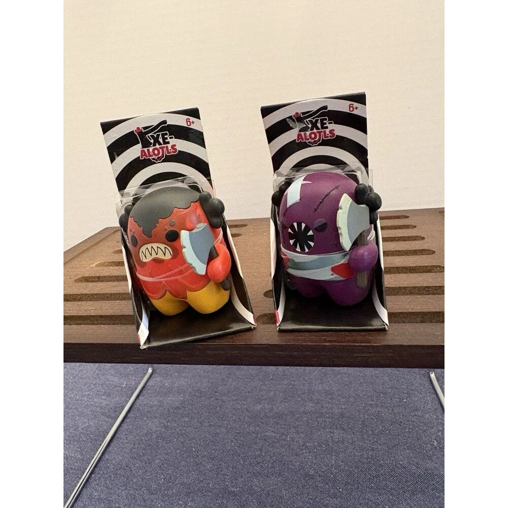 Two Axe-Alotls Figurines - Lavaxe and Headbutt